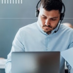 ITSM agent sits at his computer