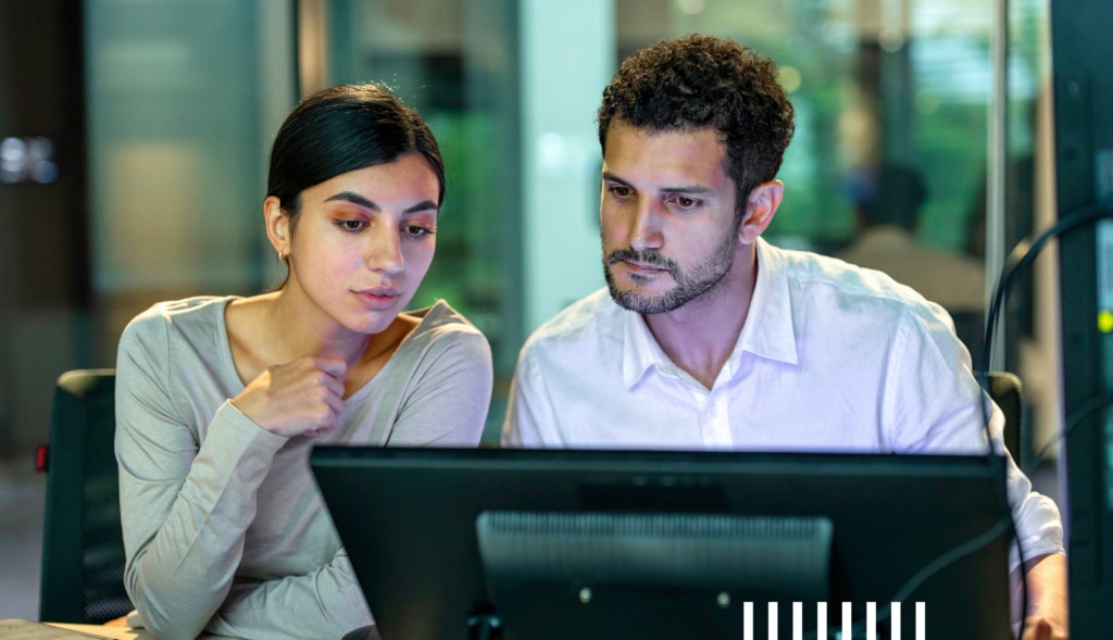 Colleagues chatting at work