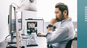 Man staring at computer screen