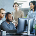 Group looking at computer screen