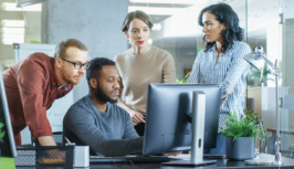 Group looking at computer screen