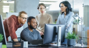 Group looking at computer screen
